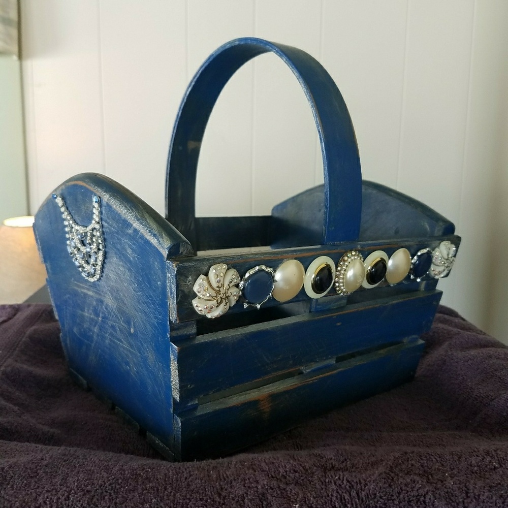 Wooden basket with vintage jewelry
